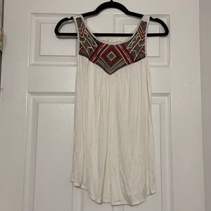 White tunic sleeveless top with red/black detail